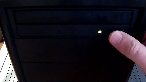 Inserting a disc in the drive Stock Footage 47241053