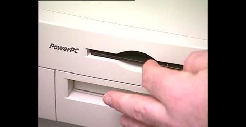 Inserting Disks into PC etc – Australia (1998) Stock Footage 310169562
