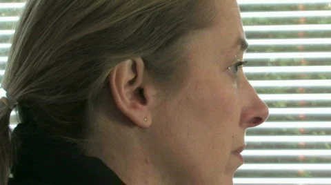 Inserting ear plugs Stock Footage