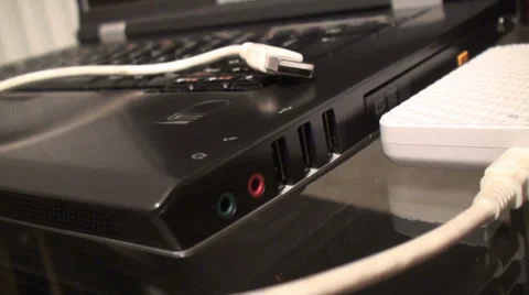 Inserting External Hard Disk into Laptop Stock Footage 35509535