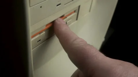 Inserting Floppy Disk With Malware Computer Virus In PC Drive, Close Up Stock Footage 172529489