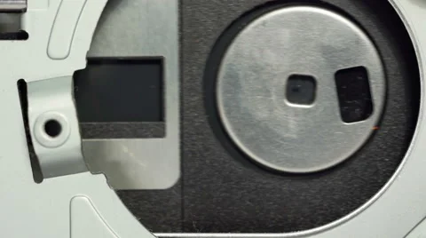 Inserting floppy disk into opened disk drive 01 Stock Footage 59862351