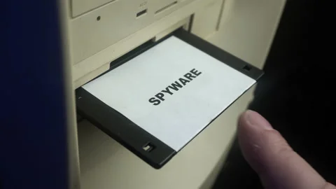 Inserting Floppy Disk With Spyware In Personal Computer Drive, Close Up Stock Footage 175926919
