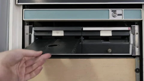 Inserting A Floppy Disk Into A Vintage Computer Drive Stock Footage 316233252