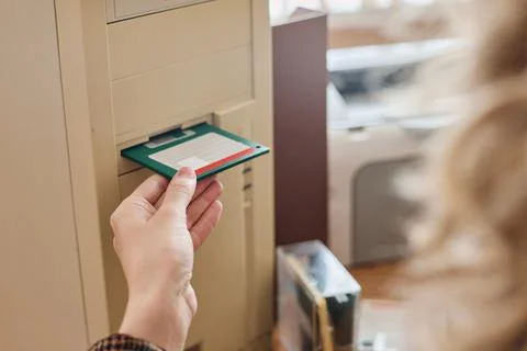 Inserting Floppy Disk into Vintage Computer Drive Stock Photos