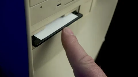 Inserting Floppy Diskette With Happy99 Computer Virus in PC Drive, Close Up Stock Footage 178890088