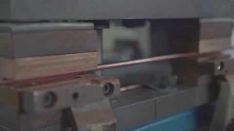 Inserting Heating Wire into Copper Tubes - Heat Exchanger Factory Production Stock Footage 330493323