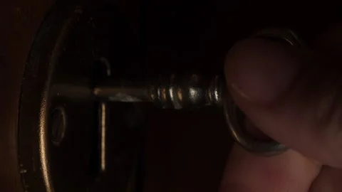 Inserting key into lock Stock Footage 269507155