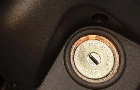 Inserting the keys to start the engine in the car. Stock Photos