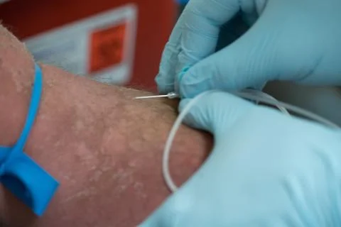 Inserting the Needle Stock Photos