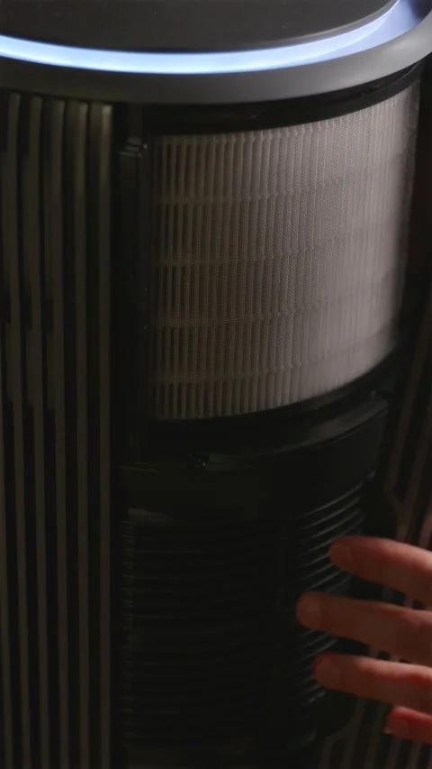 Inserting new HEPA filter into smart air purifier vertical 스톡 동영상 343872782