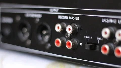 Inserting the plug cord into the professional audio device Stock Footage 86214019