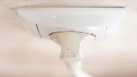 Inserting the plug into the socket close-up, top view. The euro socket does not Stock Footage 188737842