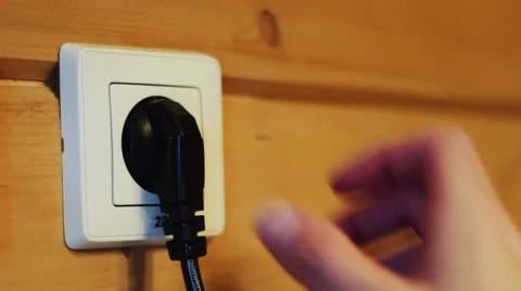 Inserting the plug into the socket Stock Footage 48050058