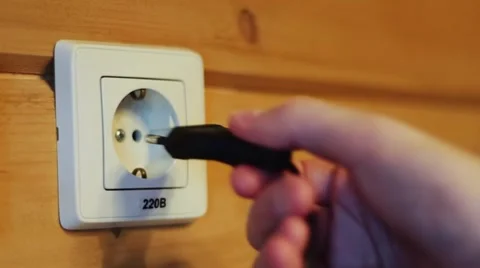Inserting the plug into the socket Stock Footage 48050177