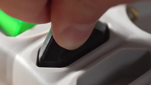 Inserting Plug into Surge Protector. Stock Footage 256236422