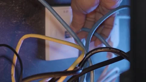 Inserting an RJ45 Cable into its Network Port 库存影片 252240484