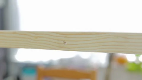 Inserting screw into board Stock-Footage 89559516