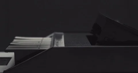 Inserting tape and closing the lid on retro audio cassette tape player recorder Stock Footage 121188729