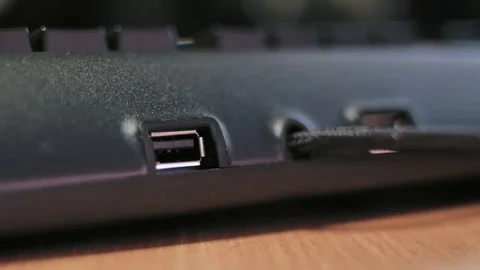 Inserting usb flash drive into computer keyboard Video stock 85402015