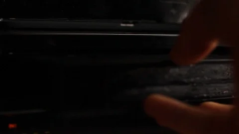 Inserting a VHS Tape Stock Footage 91160525