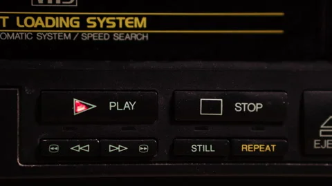 Inserting VHS Video Tape and Pressing Play Button on VCR, Close Up Stock Footage 279233304