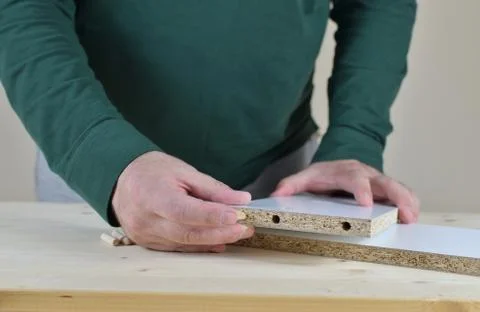 Inserting Wooden Dowels Stock Photos