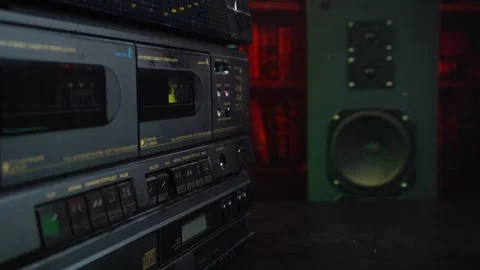 Inserting Yellow Audio Cassette Tape and Pressing Recording Button on Double Stock Footage 334528099