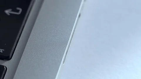 Inserts the SD card into the laptop Stock Footage 84848325