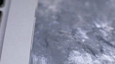 Inserts the SD card into the laptop Stock Footage 168903412