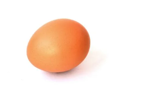 Inshell orange egg on a white background. Isolate food Stock Photos