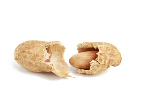 Inshell peanuts broken in half, food isolated on white background Stock Photos