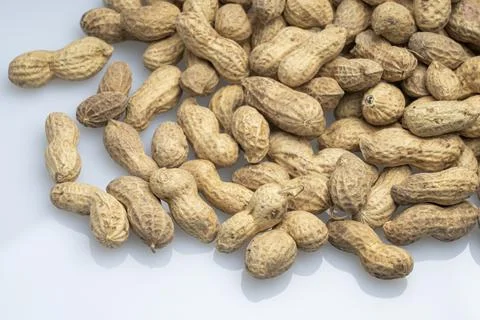 Inshell peanuts close-up, organic peanuts top view Stock Photos