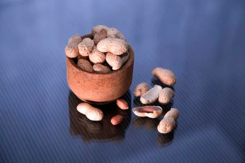 Inshell peanuts in a glass Stock Photos