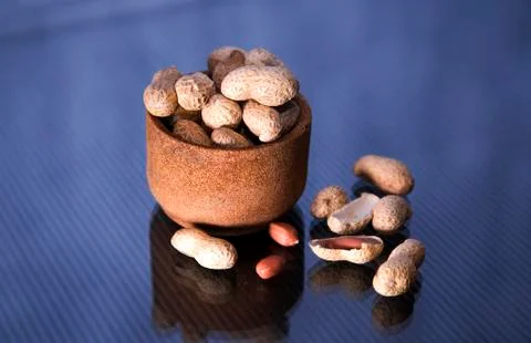 Inshell peanuts in a glass Stock Photos