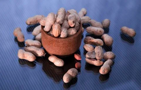 Inshell peanuts in a glass Stock Photos