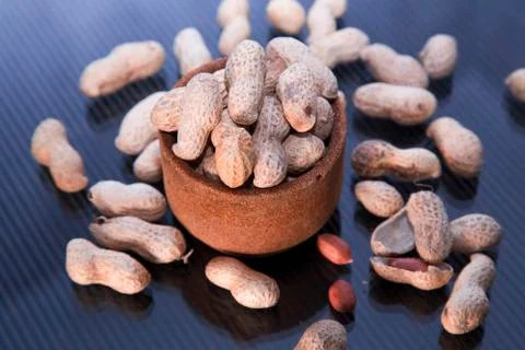 Inshell peanuts in a glass Stock Photos