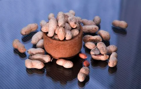 Inshell peanuts in a glass Stock Photos