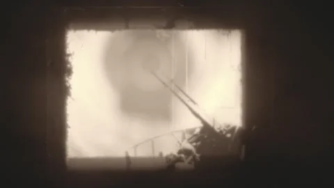 Inside of a 8 mm projector, viewing war images on the sea Stock Footage 256322112