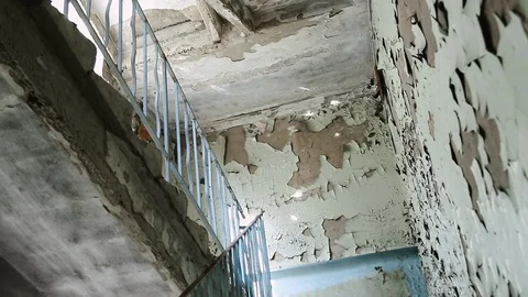Inside an abandoned building. Almost collapsed and ruined city block. Half Stock Footage 110435733