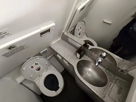 Inside Airplane lavatory Stock Photos