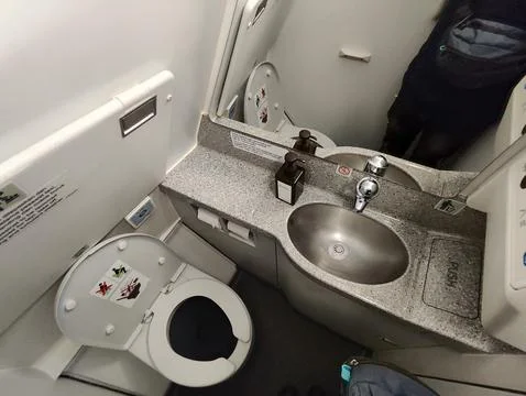 Inside Airplane lavatory Stock Photos