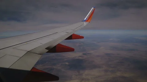 Inside Airplane Through Window Flying Over City2 Stock Footage 52515917