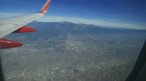 Inside Airplane Through Window Flying Over Los Angeles Stock Footage 52516348