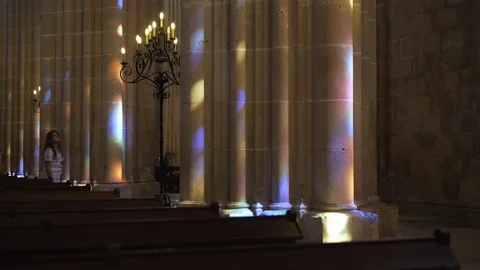 Inside ancient cathedral with illuminated columns Video stock 100441520