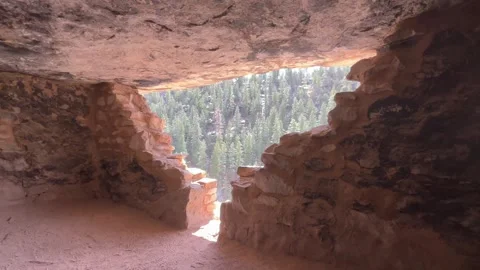 Inside an Ancient Cliff Dwelling With a View of Walnut Canyon National Monument Stock Footage 284749153