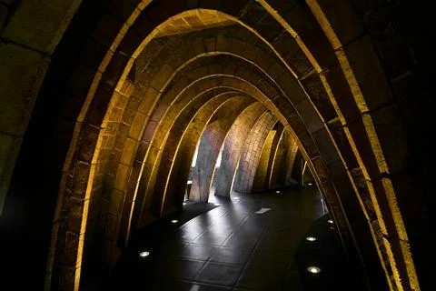 Inside an arch shaped tunnel built with bricks Stock Photos