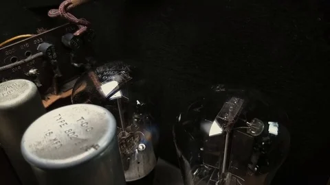 Inside of Art Deco Valve Lamp Radio from 1933 . Camera moves down Video stock 82366833