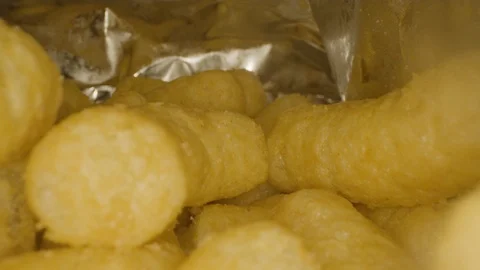Inside a Bamba snack bag 4k Stock Footage 107236880
