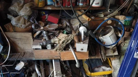 Inside the barn. Old trash on the shelves - 2. Stock Footage 115787926